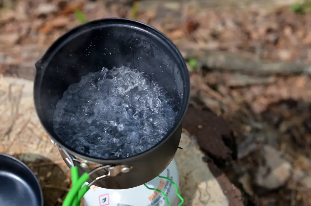 Water Boiling On Camping Stove Kettle
