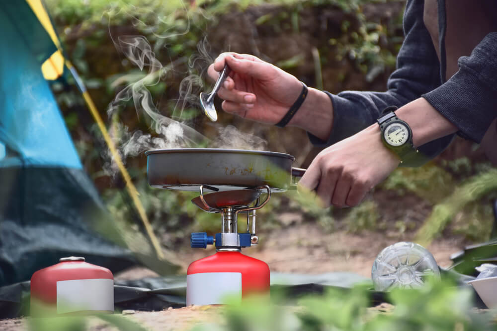 camping cooking on gas stove 